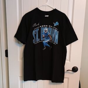 NWT Mens LARGE NFL Detroit Lions #14 St. Brown Black and Blue Graphic T-Shirt